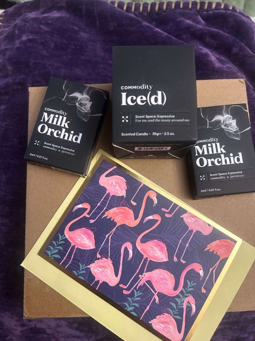 COMMODITY FRAGRANCE GIFT , candle , and two 2 ml perfumes 2 iced l 2.5  oz can